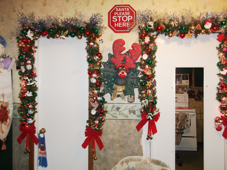 Christmas decorations around door frames. 2011 by venicet on DeviantArt